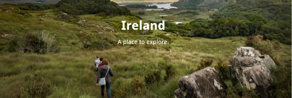 Title saying Ireland, with a family walking down a green valley